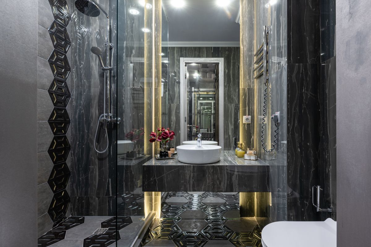 Dramatic dark marble bathroom